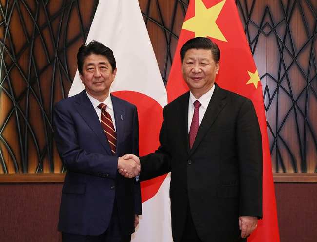 Japanese leader Shinzō Abe and Xi Jinping in 2017
