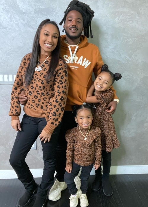 Mozzy with his girlfriend and daughters, as seen in 2020