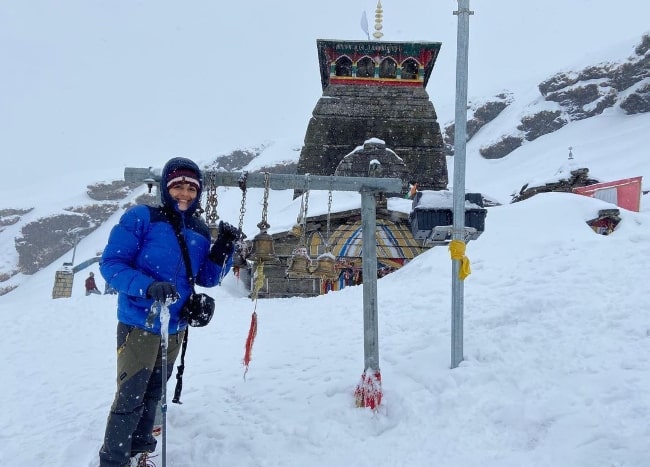 Samyuktha Menon posing for a picture at Tungnath Mahadev, one of the highest Shiva temples in the world located in Uttarakhand, India