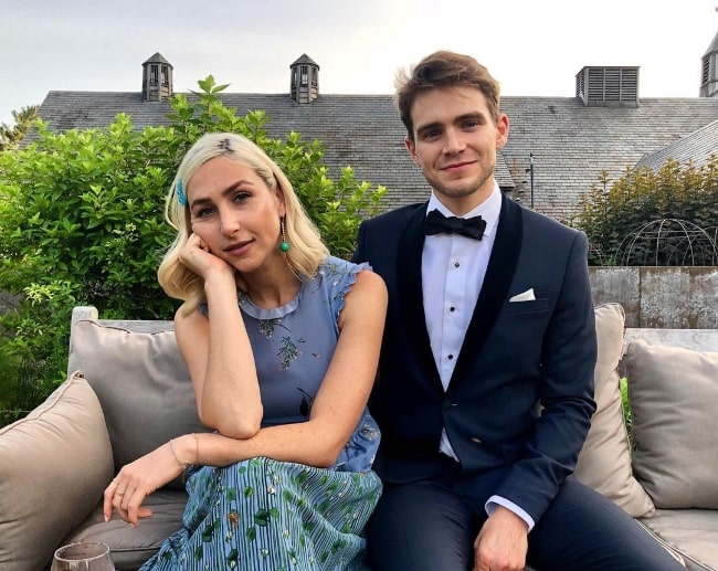 Andrew Burnap as seen while smiling for the camera with Sam Ressler at Blue Hill At Stone Barns in June 2019