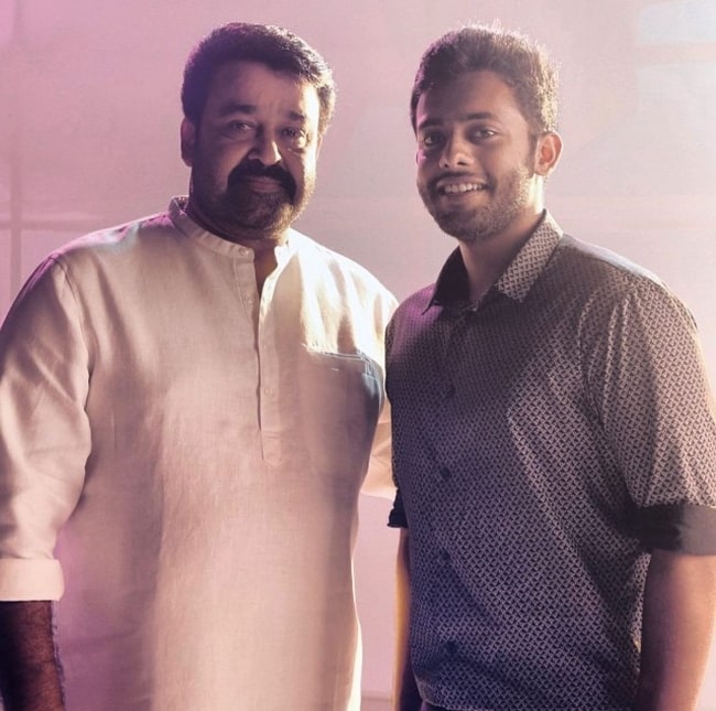 Arjun Ashokan (Right) as seen while smiling for the camera alongside Mohanlal