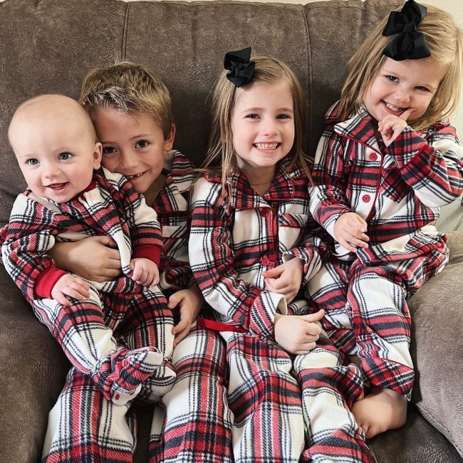Bradley Gilvin Bates as seen in a picture with his siblings Khloé, Kaci, and Jadon in December 2021