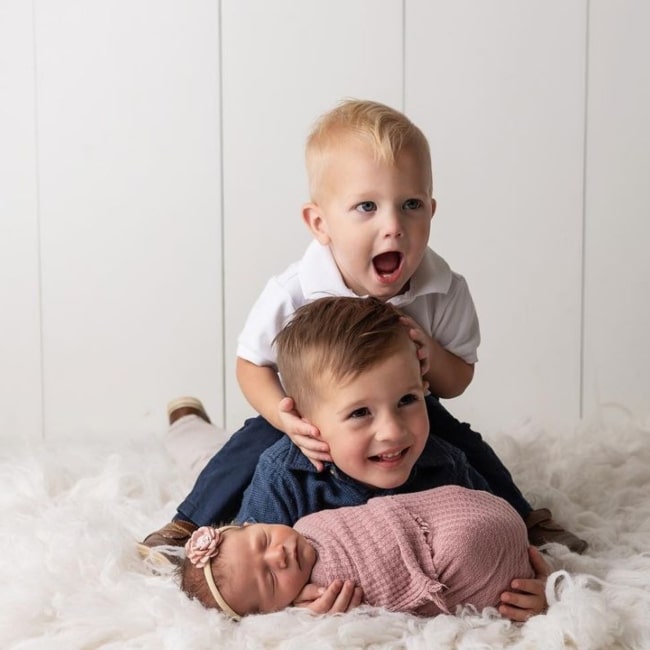 Charlotte Smith with her siblings Kolter and Kade Smith in October 2021