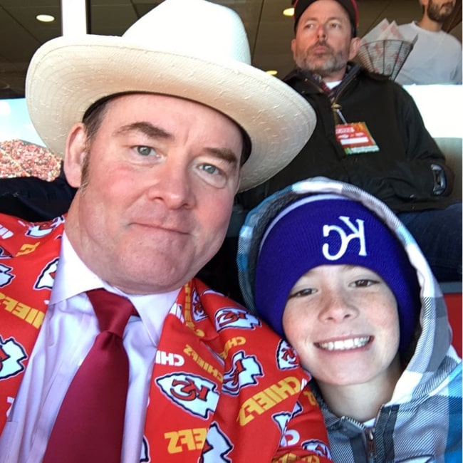 David Koechner in November 2016 having fun at the game with his son