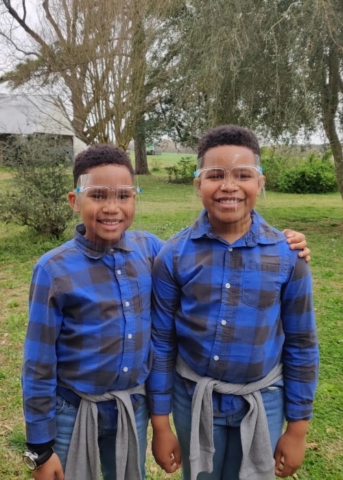 Ja'Siah Young (Left) smiling for a picture alongside his friend John A. Seay in 2022