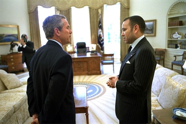 Mohammed VI of Morocco (Right) as seen while talking to US President George W. Bush in the Oval Office in Washington on April 23, 2002