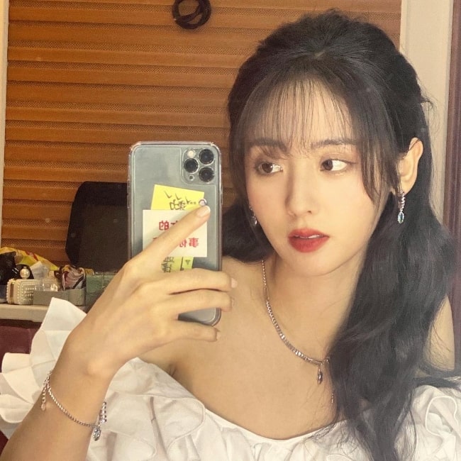 Xing Fei as seen while taking a mirror selfie in August 2021