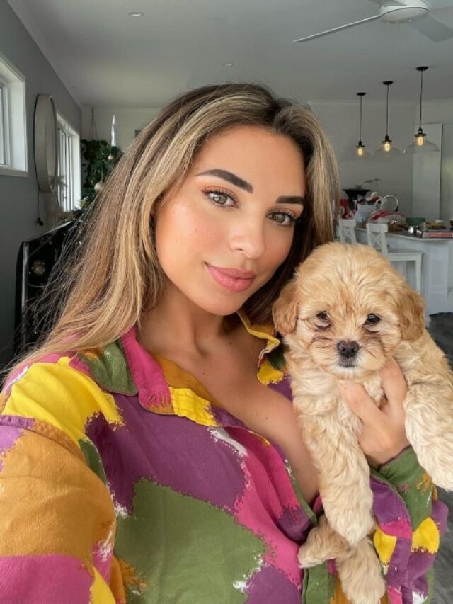 cropped-Georgia-Hassarati-in-a-selfie-with-her-puppy-Crisbo-that-was-taken-in-December-2021-Australia.jpg
