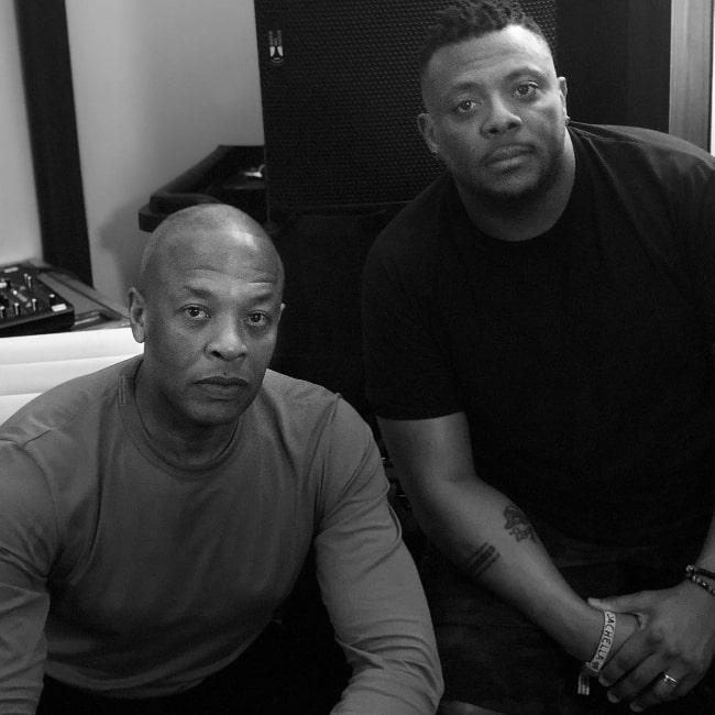 Denaun Porter (Right) and Dr. Dre posing for a picture