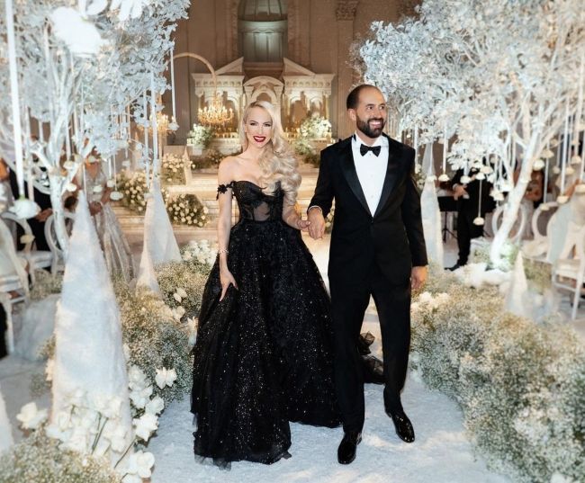 Christian seen with his wife Christine Quinn on their wedding day in 2019