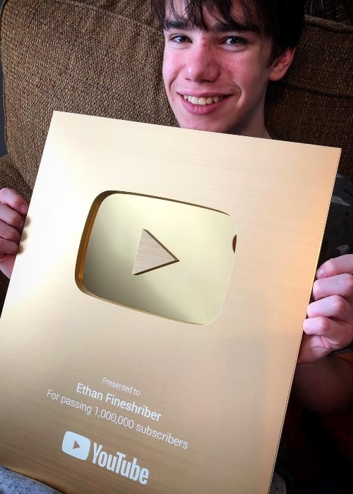 Ethan Fineshriber as seen in a picture with his 1 million subscriber plaque in February 2021