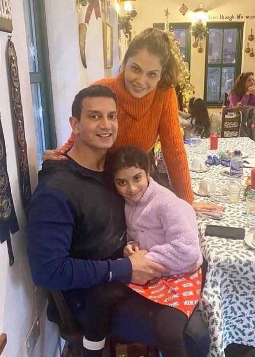Isha Koppikar with her husband and daughter, as seen in January 2022