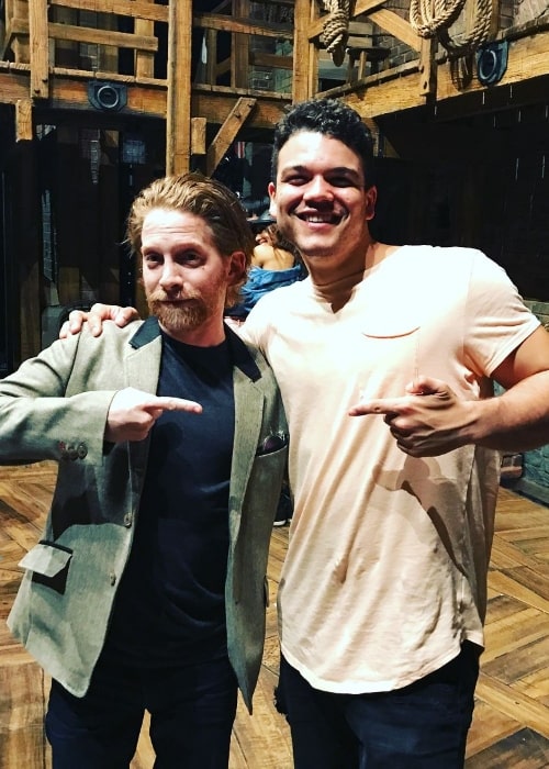 Josh Andrés Rivera (Right) posing for a picture alongside Seth Green at the Hollywood Pantages Theatre in Los Angeles, California in 2017