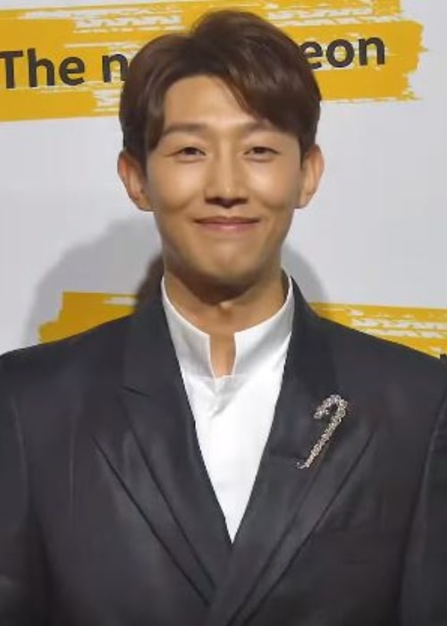 Kang Ki-young as seen while smiling for the camera during an event