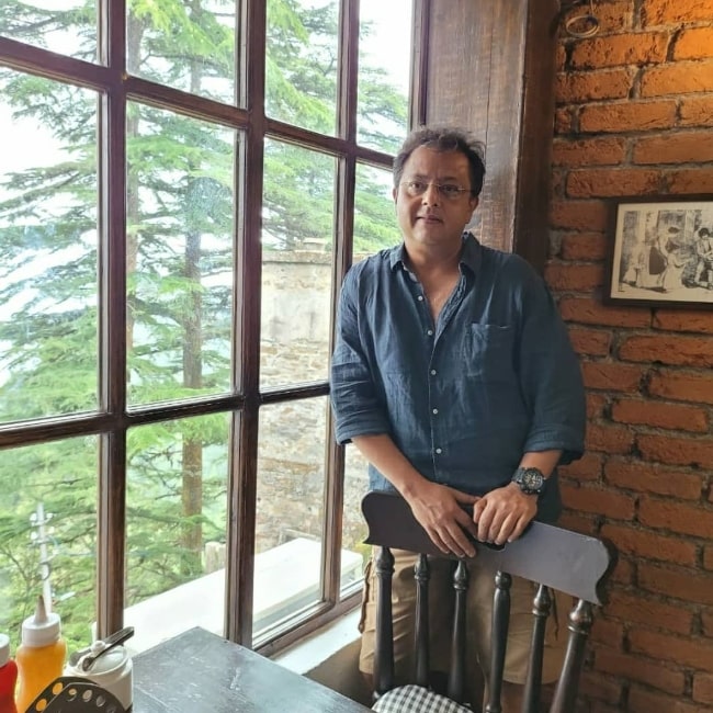 Nitesh Pandey smiling for a picture at Landour Bakehouse in Landour, Mussoorie, Uttarakhand in June 2021