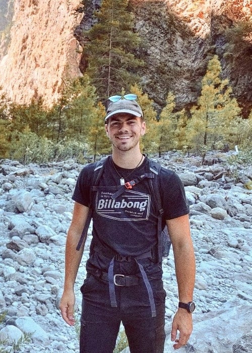 Sam Retford as seen while smiling for a picture during a hike in 2020