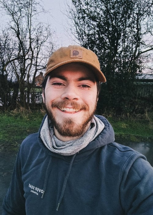 Sam Retford smiling while taking a selfie in March 2021