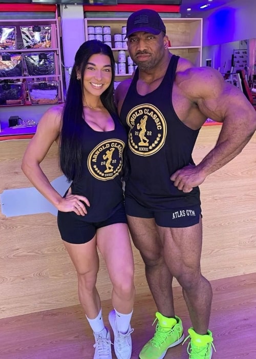 Cedric McMillan posing with a workout partner in January 2022