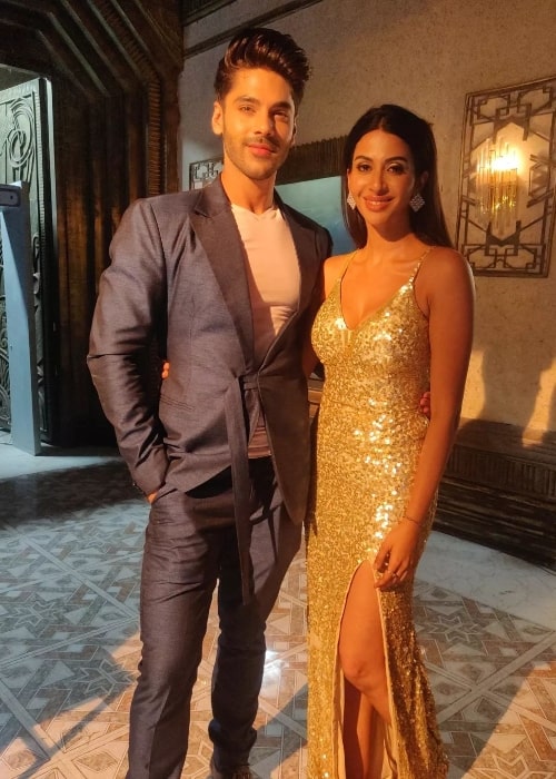 Gayathiri Iyer posing for the camera alongside Simba Nagpal in April 2022