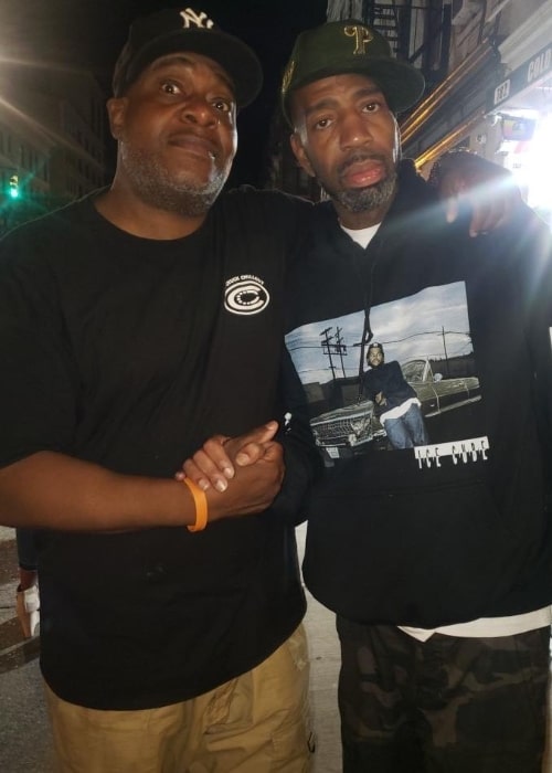 Grand Daddy I.U. (Right) as seen while posing for a picture alongside DJ Chuck Chillout in August 2019