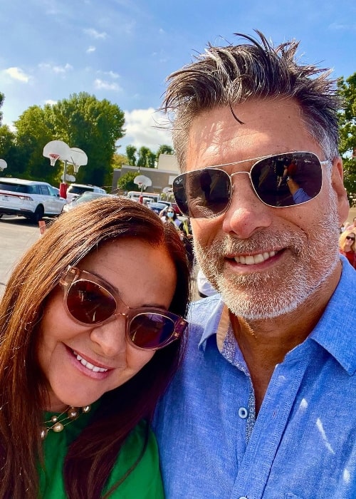 James Hyde smiling in a selfie with Sue-Ling Garcia at St. Mel's Catholic School in California in April 2022