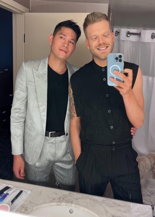 Mark Manio as seen in a selfie with his beau Scott Hoying that was taken in April 2022