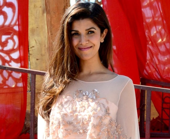 Nimrat Kaur posing for a picture at the success media meet for the film 'Airlift' in 2016