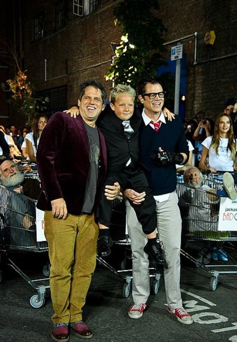 (From left to right) Jeff Tremaine, Jackson Nicholl, and Johnny Knoxville as seen in 2014