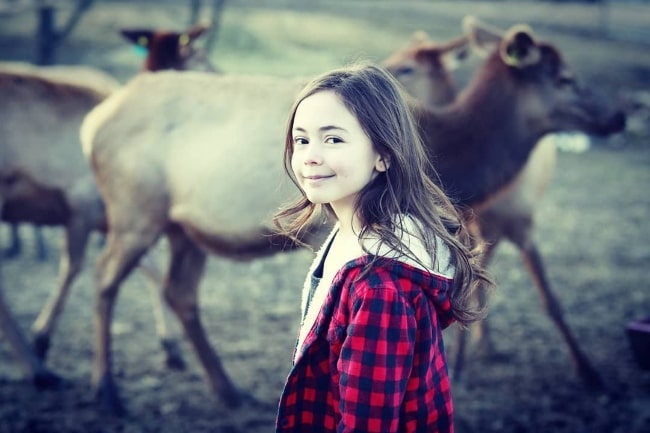 Hala Finley on an elk farm in Smithville, Missouri in January 2020