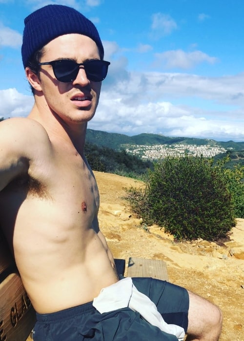 Spencer Neville as seen while posing shirtless for a picture at the Los Leones Trailhead in Los Angeles, California in July 2018