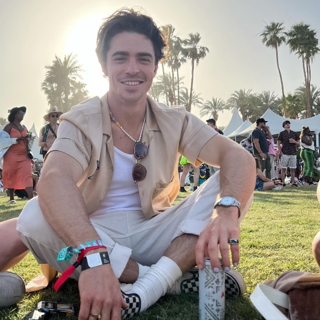 Spencer Neville as seen while smiling for the camera at the Coachella Music Festival in April 2022