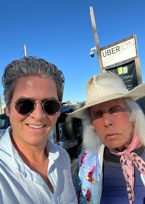 Trevor Wright (Left) as seen while taking a selfie with James F Goldstein in Beverly Hills, California in March 2022