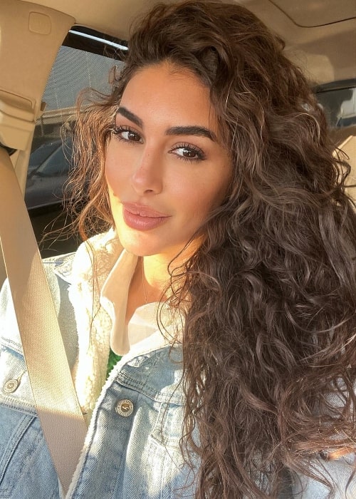 Yasmine Sabri as seen in a sun-kissed car selfie in March 2022