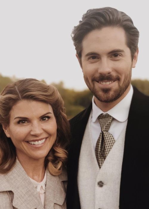 Chris McNally and Lori Loughlin as seen together in 2019