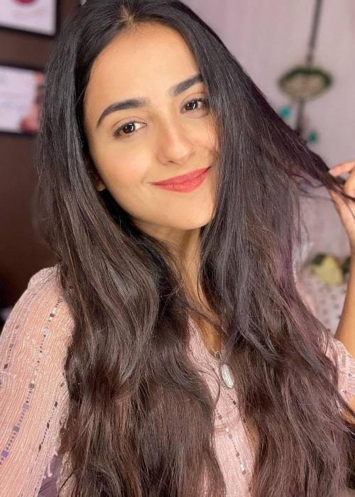 Debattama Saha smiling in a selfie in April 2022
