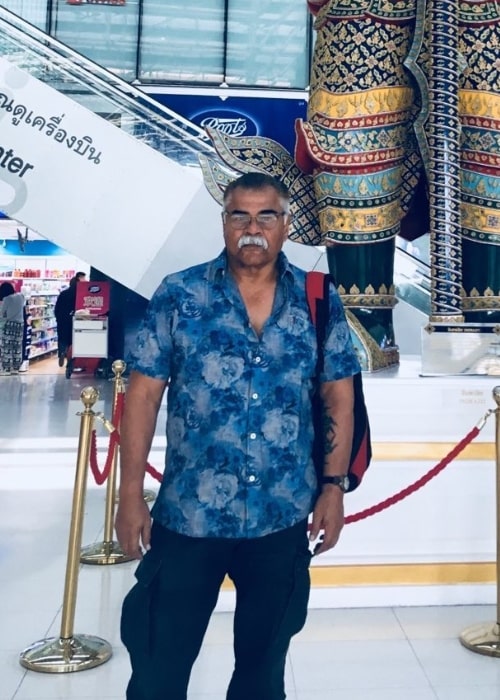 Sharat Saxena as seen while posing for a picture at the Bangkok Airport in July 2021