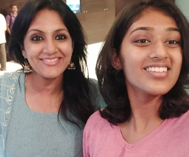 Devadarshini (Left) smiling alongside her daughter in a selfie