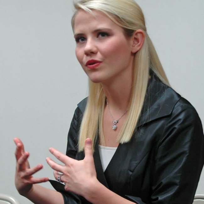 Elizabeth Smart speaks to local media outlets before the event at Fitzsimmons-John Arena in Moberly, Mo., on Tuesday, June 19, 2012