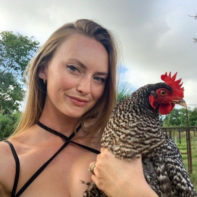 Jordan Roemmele as seen in a selfie with a rescued rooster in July 2022, in Austin, Texas
