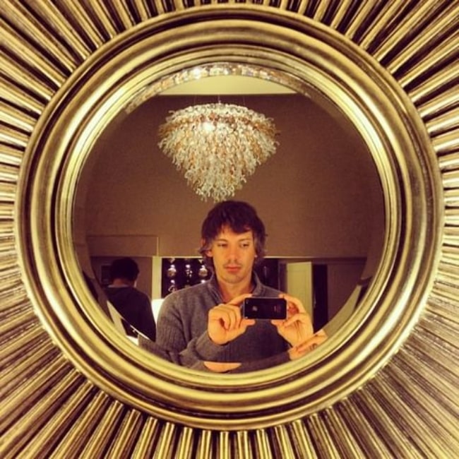 Lukas Haas having a lovely time taking his selfie at a beautiful mirror in March 2013