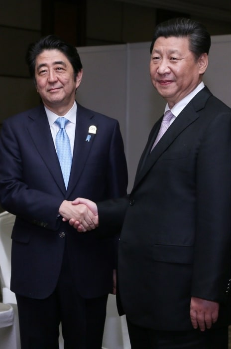 Shinzo Abe (Left) and Xi Jinping at the Japan-China Summit Meeting in Jakarta on April 22, 2015