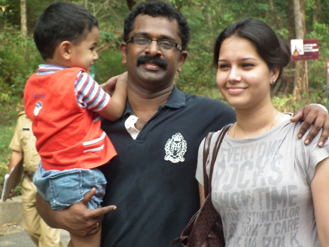 Sreejith Ravi with his wife and son in 2011