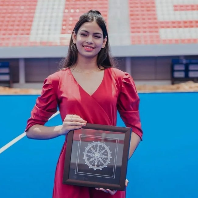 Sriya Lenka with an award presented by the on behalf of the Government of Odisha, by former Indian Hockey Captain and Sundargarh's pride Sri Dilip Tirkey in June 2022
