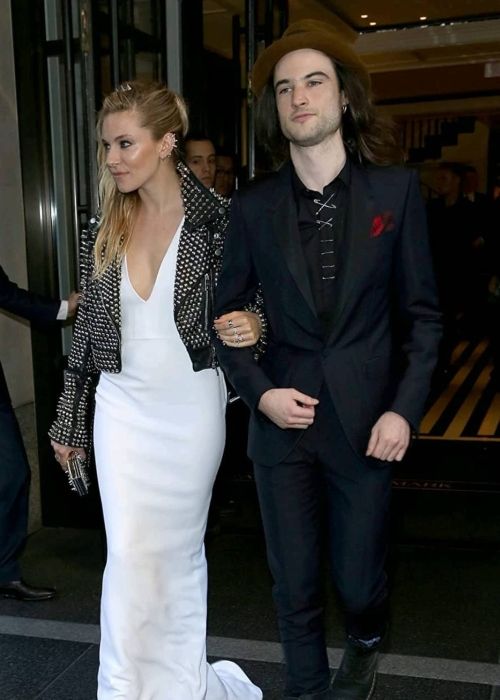 Tom Sturridge and Sienna Miller as seen posing together