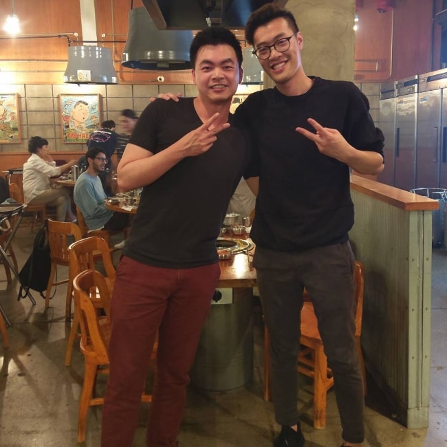 WildTurtle in a picture with fellow gamer Alex Chu in September 2017