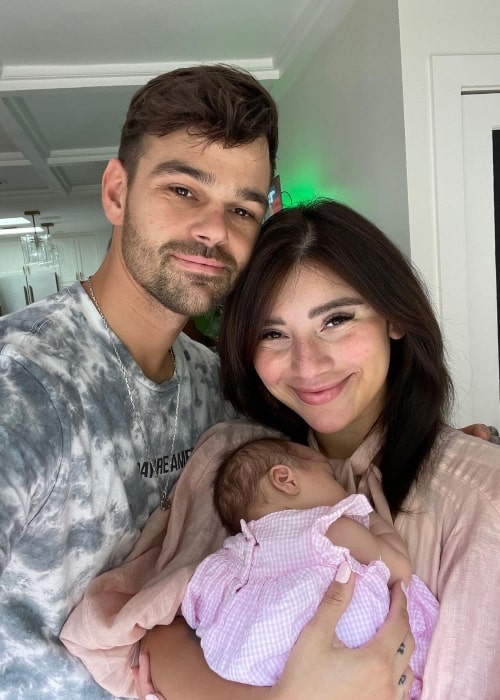 Ben Hausdorff and his wife Kirstin Maldonado along with her child Elliana Violet in July 2022