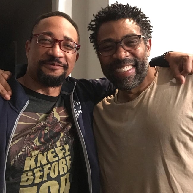 Damon Gupton (Left) posing for a picture with Cress Williams in 2021