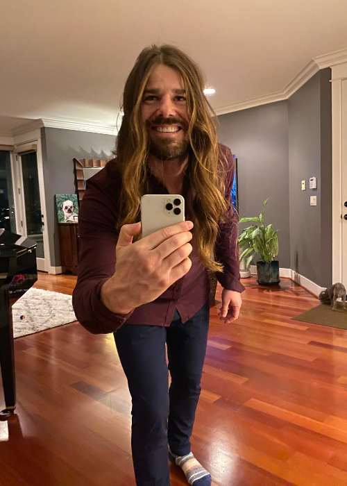 Dan Price seen taking a selfie in February 2021