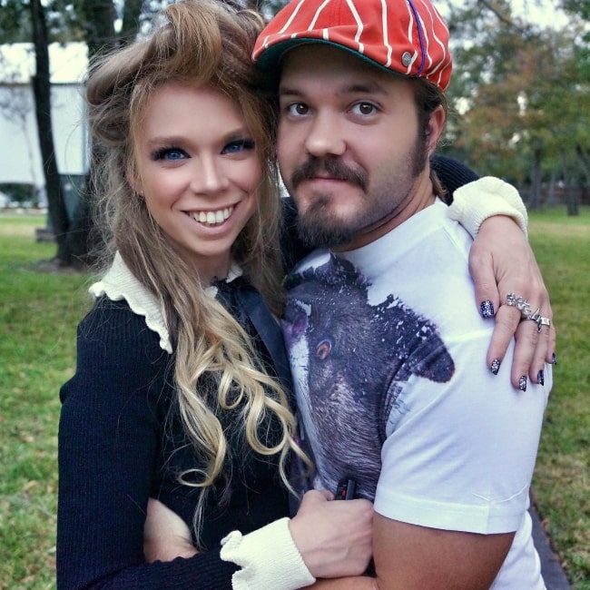Dog Man and his girlfriend Grav3yardgirl in a picture that was taken in August 2022