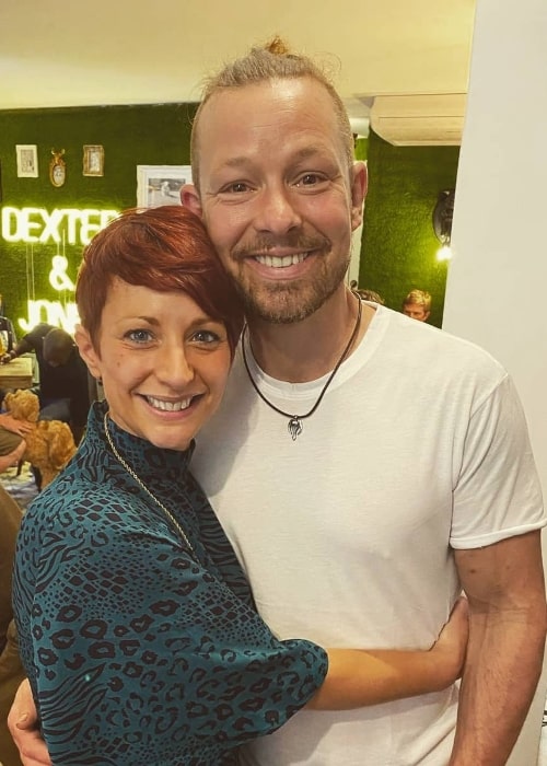 Adam Rickitt smiling for a picture with Katy Fawcett in June 2021